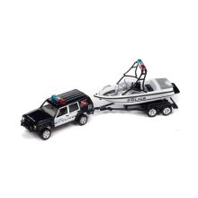 Jeep Cherokee with mastercraft boat & light bar